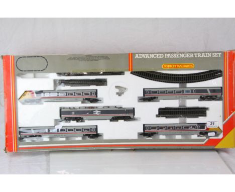 Boxed Hornby OO gauge R543 Advanced Passenger Train Set appearing complete with engine and rolling stock