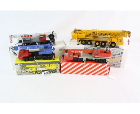 Four boxed 1:50 diecast construction models to include Conrad x 2 (2081 Demag AC435 &amp; 2084 Faun) and NZG x 2 (Demag Hydra