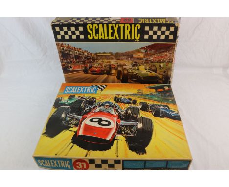 Scalextric - two vintage boxed sets, Sports Set 31 &amp; Set 32, both appear complete, with slot cars and instructions