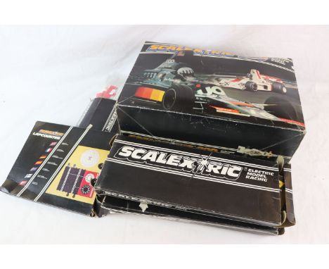 Boxed Scalextric 200 to include track, 2 x slot cars, 2 x controllers, power pack, and instruction manuals, 2 x boxed track, 