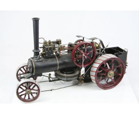 Large well built steam engine, metal, in black with maroon, approximately 2 foot in length, outside length of back wheels 10"