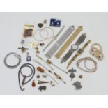 1 Damenarmbanduhr WG 18ct. z.T. besch., 2 Armreife je GG 18ct. z.T. aufgeschnitten, 1 loser Stein wo