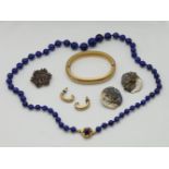 1 Brosche/Anhänger GG 8ct. mit Granate sowie 1 Konv. Modeschmuck z.T. Metall vergoldet, je Asp./Tsp.