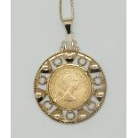 1 Kette/1 Goldmünzanhänger je GG 14ct. England, je min. Tsp.