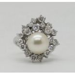 1 Damenring WG 18ct. mit Perle ca. D 9mm und Brillanten lt.. Schiene zus. 1,21ct. W-if (undeutl. ges