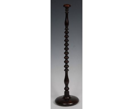 A 19th century mahogany bobbin turned wig stand, circular base, 50cm high 