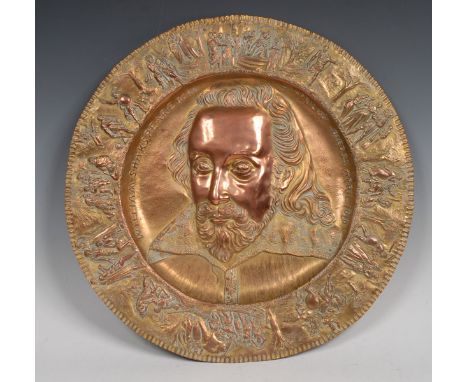 A Victorian gilt electrotype charger, by Elkington, Mason & Co Ltd, embossed to with a titled portrait of William Shakespeare