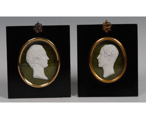 A pair of 19th century Sevres type biscuit porcelain portrait plaques, Duc d'Orleans and companion, facing to dexter and sini