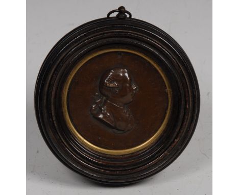 A 19th century portrait medallion, George III, King of Great Britain, 5.5cm diam, framed