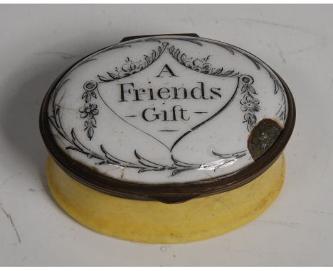 A George III South Staffordshire enamel oval patch box, hinged cover transfer printed with a shield shaped cartouche and insc