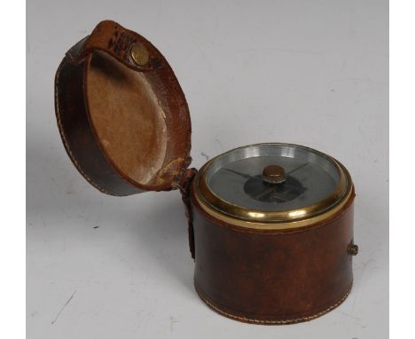 A Victorian travelling aneroid barometer, 6.5cm silvered register, leather case, 8cm diam overall, c.1890