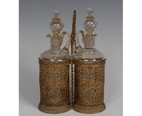 A Dutch brass filigree two-bottle decanter stand, the clear glass bottles inscribed in enamel Erven Lucas Bols, Amsterdam, kn