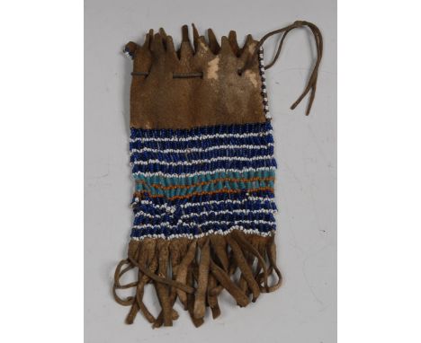 A Native American beadwork Reservation ration ticket bag, worked in horizontal bands, 18.5cm long, Great Plains, early 20th c
