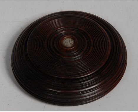 A George III draught turned yew snuff box, the push-fitting cover centred by a mother of pearl roundel,8cm diam, early 19th c