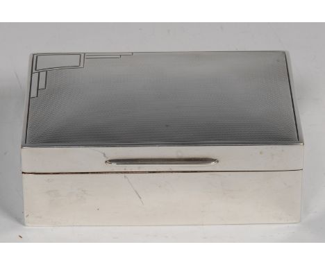 An Art Deco silver rectangular cigarette box, hinged engine turned cover with geometric motif to angle, cedar lined, 13.5cm w