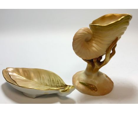 A Royal Worcester blush ivory miniature Cornucopia vase, coral stem, 9.5cm high;  a similar leaf trinket dish (2) 