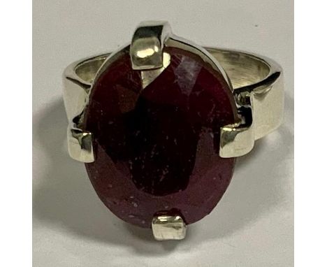 A Ruby solitaire ring, oval mixed cut ruby approximately 14ct, 925 silver shank 