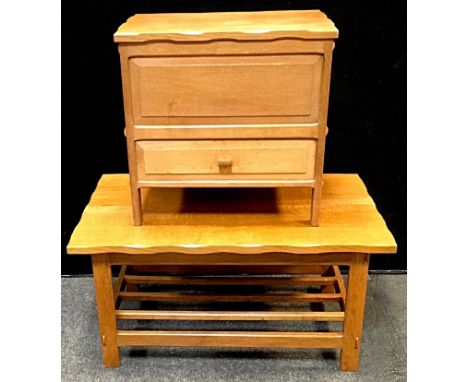 A light oak coffee table with pegged joints, slatted under tier, maker?s mark AL 1980 carved to under side; a conforming work