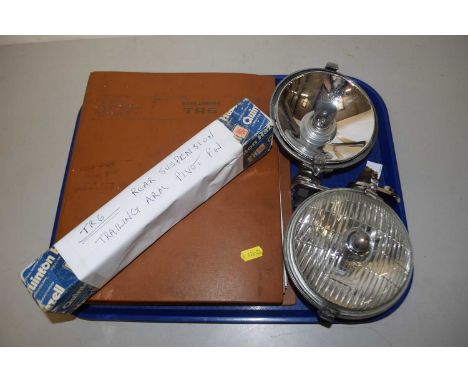 Triumph TR6 repair manual together with suspension trailing arm pivot pin and two further head lamps (one damaged)
