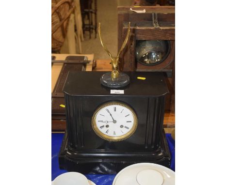 Victorian black slate cased mantel clock with eagle mount