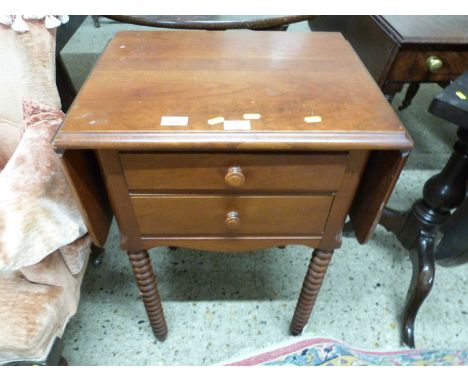 Dark wood drop leaf table on bobbin turned legs