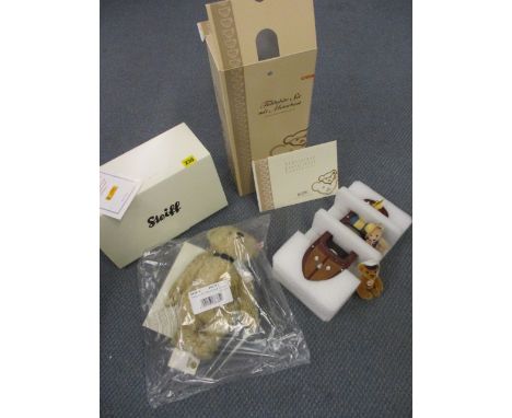 A Danbury Mint Steiff, blond Diana bear in a sealed bag with box, a Steiff motorboat model, together with two miniature Steif