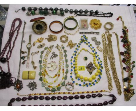 Mixed costume jewellery to include vintage beads, together with a ladies watch A/F and a vintage bedside clock