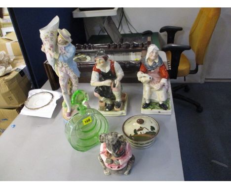 A mixed lot to include an art deco green decanter, a pair of Staffordshire figures, a butter dish and an Austrian cream ware 