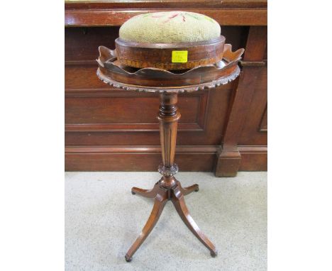 A mahogany pedestal occasional table and a tapestry upholstered stool