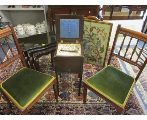 A Wylie & Lockhead oak sewing table, a pair of gallery back, upholstered occasional chairs, a nest of tables and an oak frame