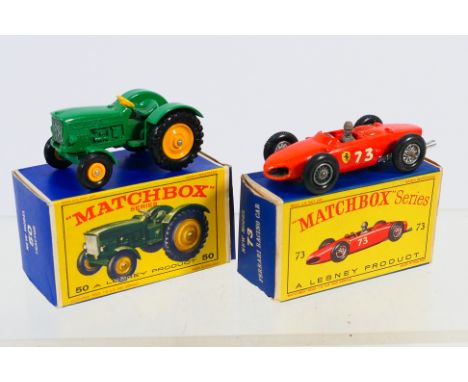 Matchbox - 2 x boxed models, a John Deere Lanz 700 Tractor with black tyres # 50 and a Ferrari Racing Car with grey plastic d