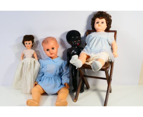 Unmarked Makers - A group of vinyl, plastic and composition unboxed vintage dolls in a variety of sizes ranging from 50cms - 