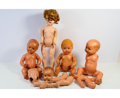 Rosebud - DIL - Others - A group of five unboxed composition and plastic dolls, in various sizes. Conditions range Poor - Fai