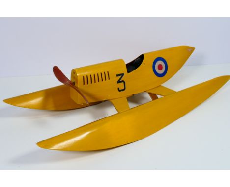 A wooden, battery powered and unmarked, probably scratch built, model of an RAF Seaplane Catamaran. The model measures approx