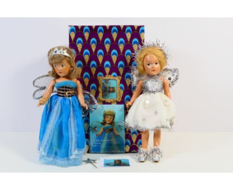 Unmarked Makers - Two 1940's composition dolls in 'Fairy' costumes. One doll comes with card / certificate marked 'One of a K