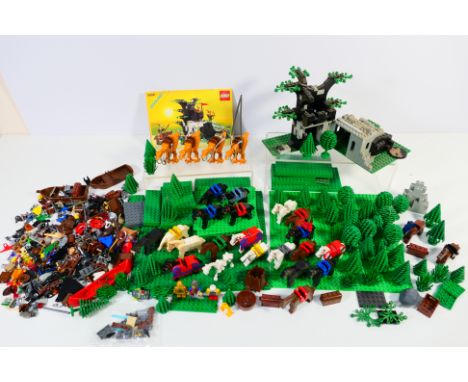 Lego - A large loose quantity of Lego parts and accessories plus a quantity of accessories which are mainly associated with L