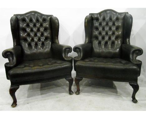 Pair of olive green leather button upholstered wingside chairs on carved cabriole supports, in the 18th century style, 41cm h