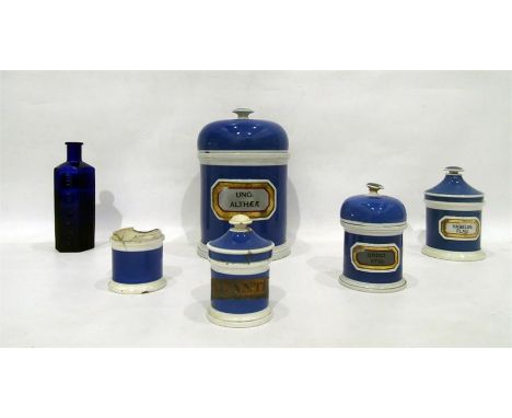 Five various ceramic pharmaceutical jars and a blue glass jar (damaged) (6)   