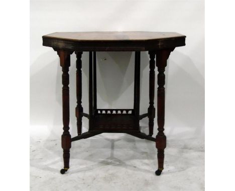 Edwardian walnut octagonal-top table, on ring turned supports, the cross-stretcher with under-shelf, on castors, width 76cm  