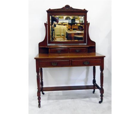 Edwardian mahogany dressing table with pivoted bevelled plate mirror, two short drawers over two frieze drawers, turned suppo