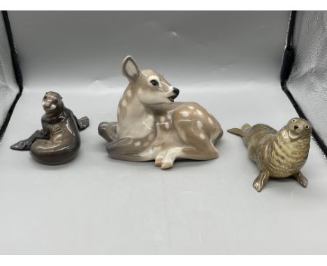 Royal Copenhagen - Bambi Deer, Rosenthal Germany - Sea Lion, and Beswick England - Sea Lion
All in good condition