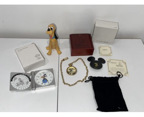 Assorted Walt Disney Memorabilia to include Walt Disney - Pluto, Disney - One Travel Alarm Clock, and Jiminy Cricket Gold Ton