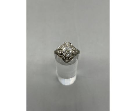 Beautifully designed Diamond Ring, Centre Diamond 1.25ct on 18ct and Platinum, not hallmarked, Centre Diamond surrounded by a