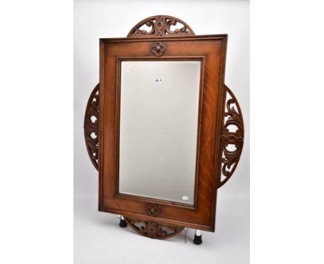 AN EARLY 20TH CENTURY ENGLISH OAK FRAMED MIRROR, circa 1920, with original bevelled edge plate, portrait or landscape, very g