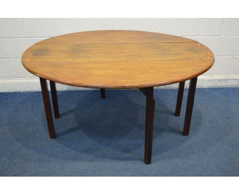 A GEORGIAN MAHOGANY GATE LEG TABLE, on square block legs, length 151cm x open width 115cm x closed width 43cm x height 74cm (