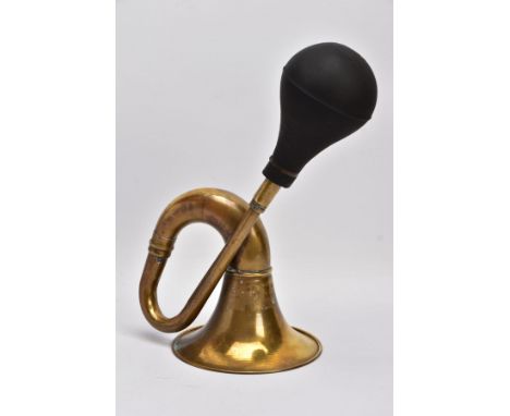 A BRASS AND RUBBER CAR HORN, circa 1910-20, in working order, replacement rubber, length approximately 35cm