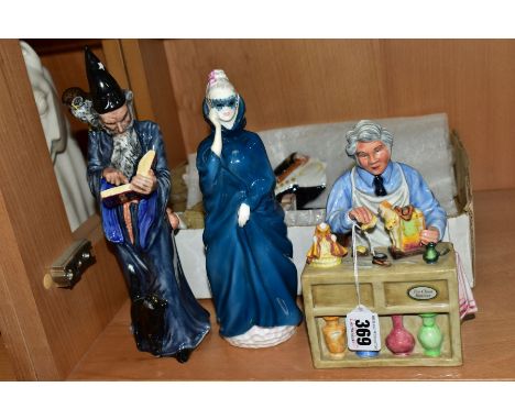 FOUR ROYAL DOULTON FIGURES, comprising 'The China Repairer' HN2943, 'Masque', HN2554, 'The Wizard' HN2877 and 'The Captain' H
