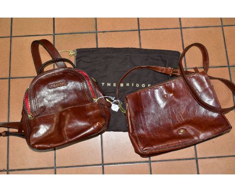A LADIES 'THE BRIDGE' BROWN LEATHER HANDBAG, well used condition, width 29cm x depth 22cm approximately, with dust bag, toget