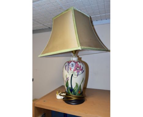 A  MOORCROFT POTTERY TABLE LAMP IN THE 'FLY AWAY HOME' PATTERN, designed by Rachel Bishop, mounted on an ebonised plinth, bea