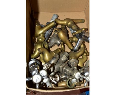 A BOX OF TAPS AND TAP PARTS, including brass taps, stainless steel finished taps, some having ceramic H &amp; C inserts, some